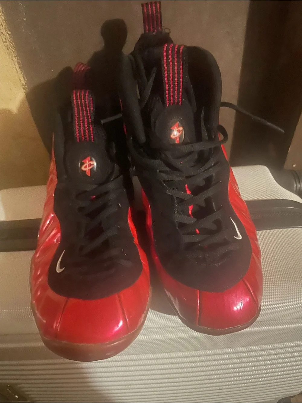 Nike men’s Red and Black Foamposite Sneakers
